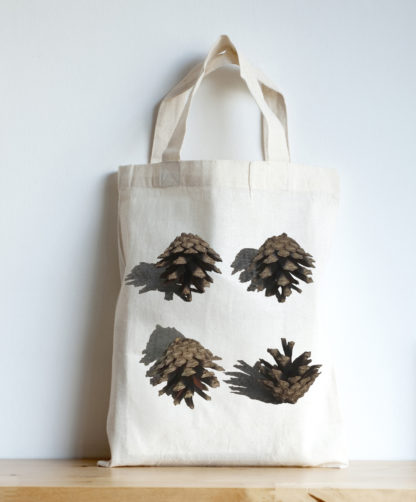 Image of mini tote featuring pine cones photographic print