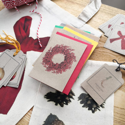 Christmas gift wrap set including eco-friendly note cards, gift tags, gift bags
